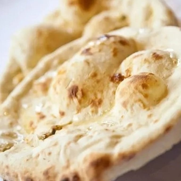 Indulge in Our Butter Naan